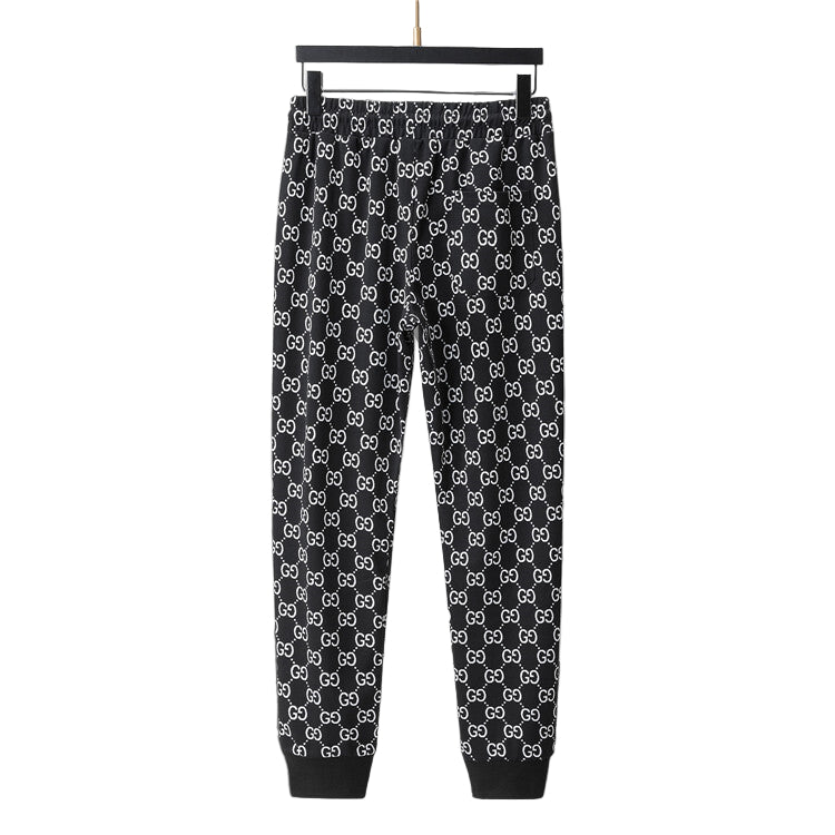 Black pants with white pattern on a gray background