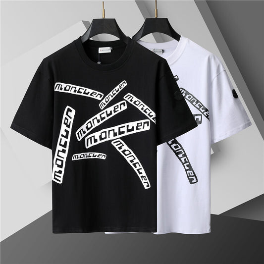 Black and white t-shirts with 'moncler' branding on a gray background