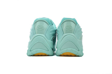 Pair of teal sneakers showing sole design on a white background