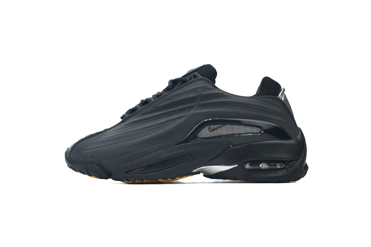 Black sneaker with a white background