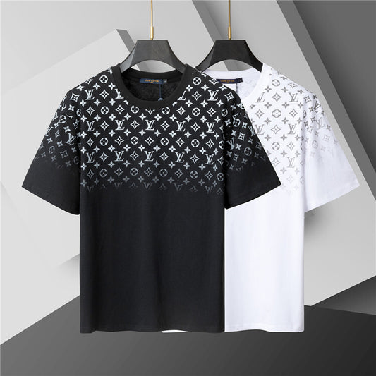 Black and white t-shirt with monogram pattern on a geometric background