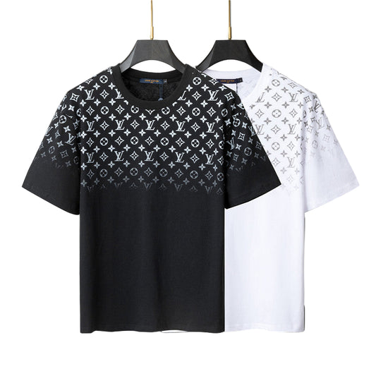 Black and white t-shirt with monogram pattern on a geometric background