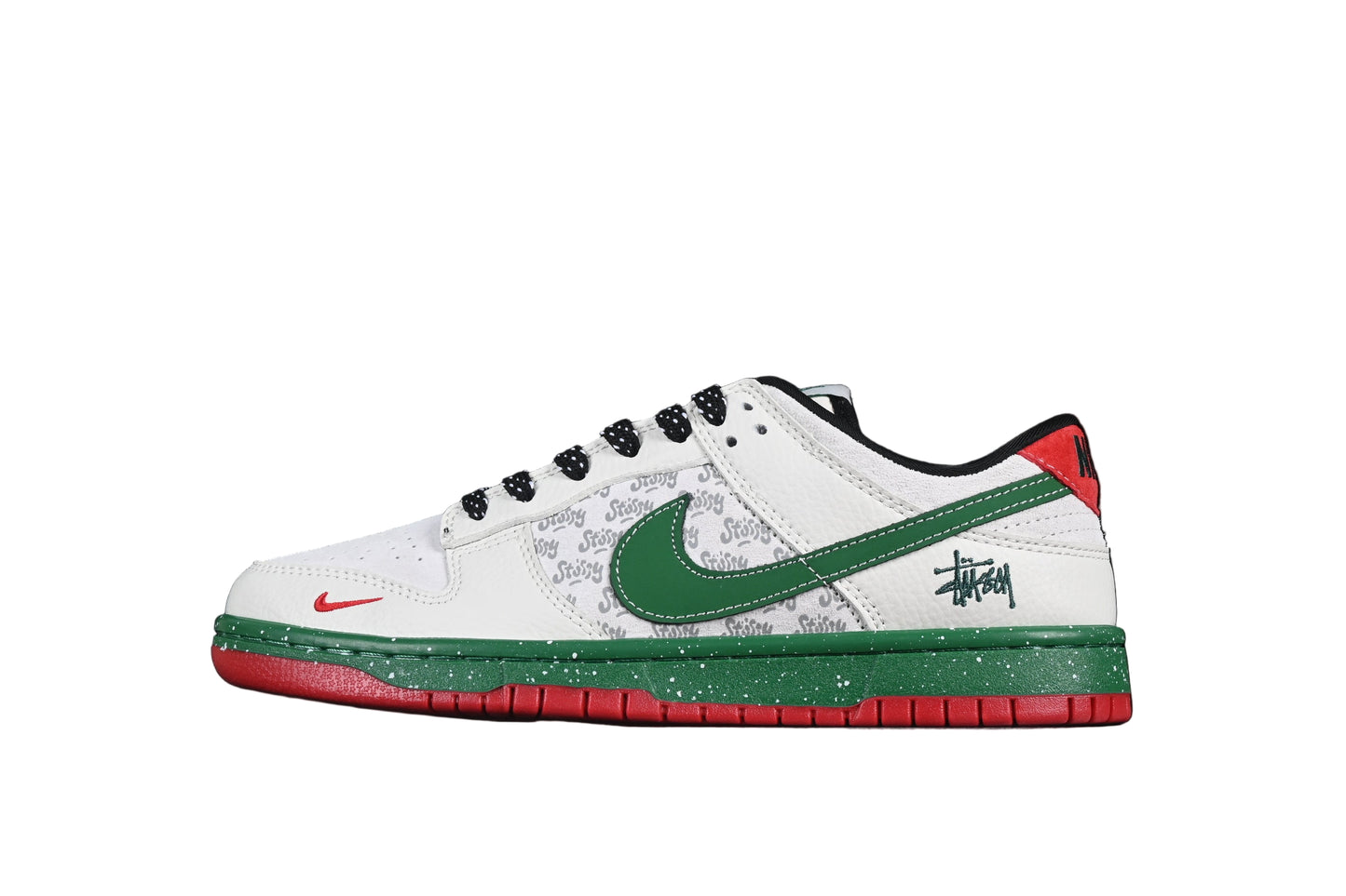White sneaker with green and red accents on a black background