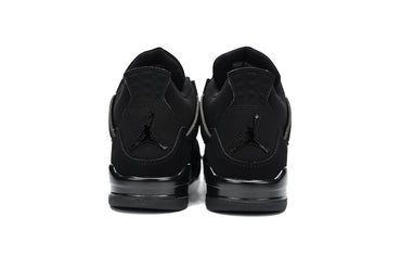 Black sneakers shown from the back on a white background