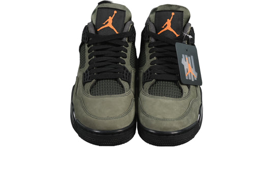 Pair of green sneakers with orange l on a black background