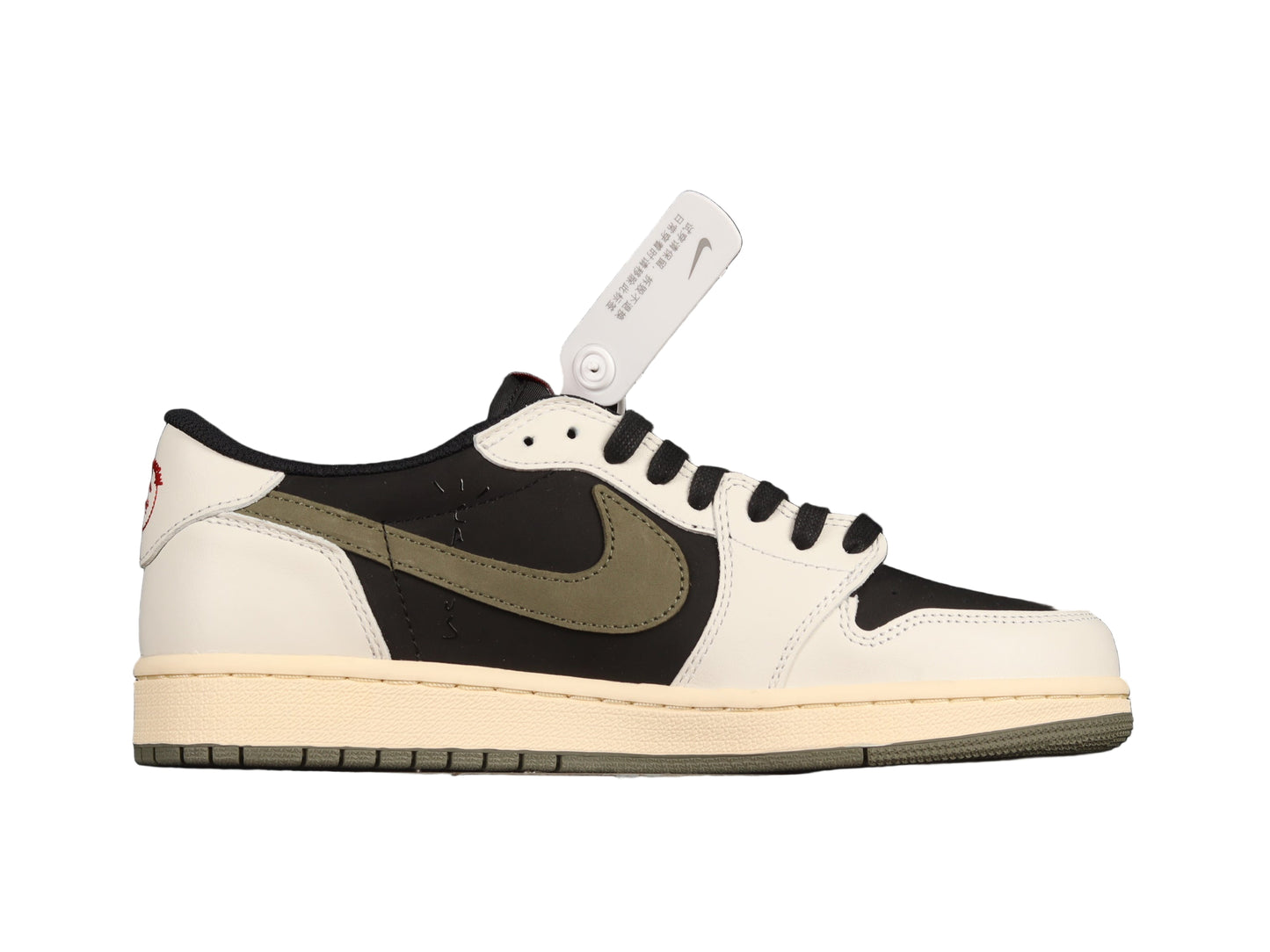 Black, white, and brown sneaker with graphic on a black background