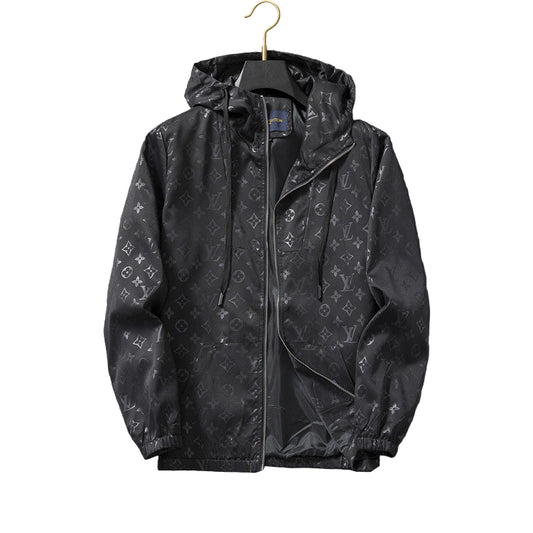 Black jacket with graphic on a gray surface