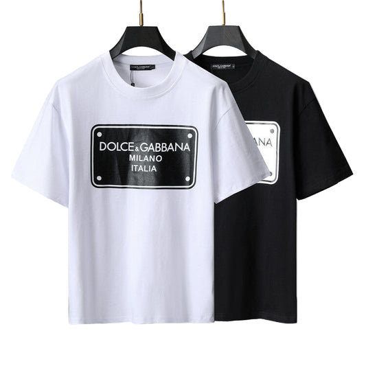 White and black t-shirts on a gray background
