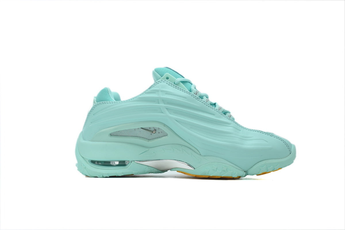 Light blue sneaker on a white background
