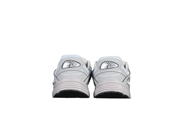 Pair of gray sneakers on a black background