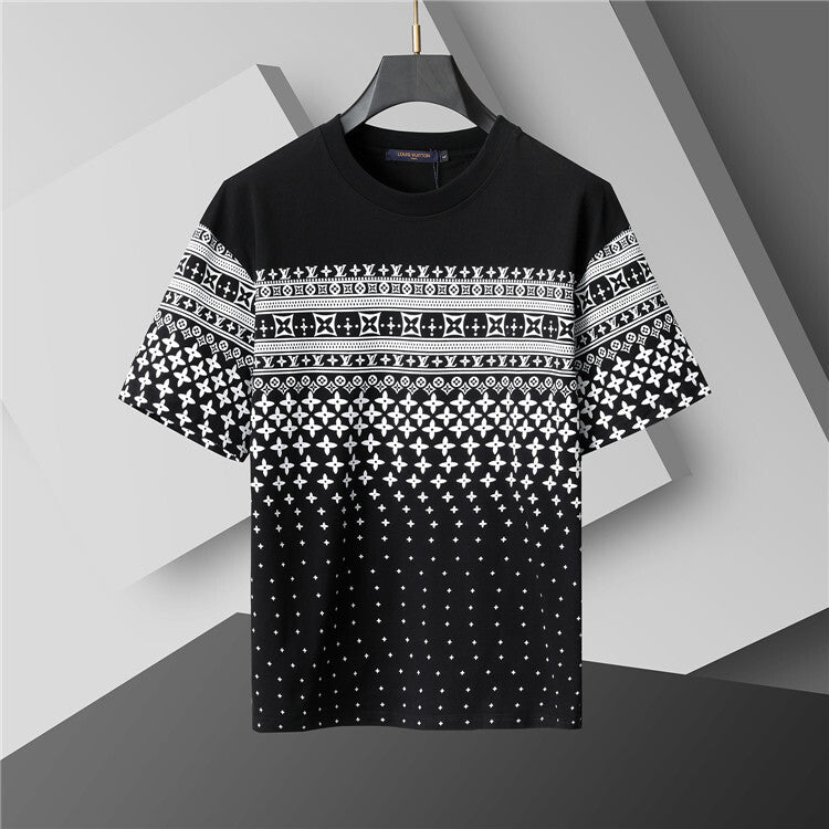 Black t-shirt with white geometric patterns on a gray background
