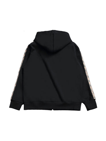 Black hoodie on a hanger against a gray background