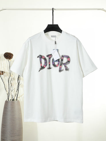 Black or White Distressed Letter Graphic T-Shirt with Color Accents