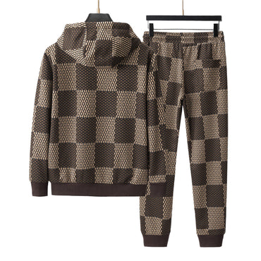 Checkered hoodie and pants set on a gray background