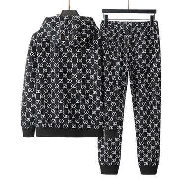 Black hoodie and pants with white pattern on a gray background