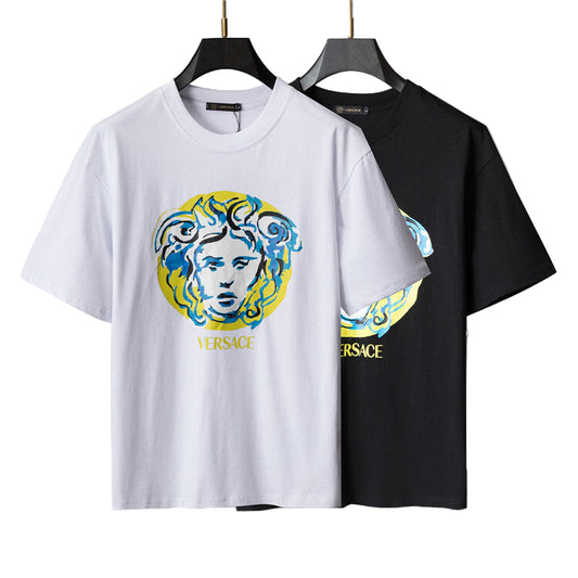 White and black t-shirts with graphic design on a gray background