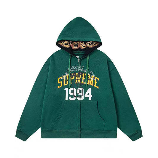 Green hoodie with 'Supreme 1994' text on a white background