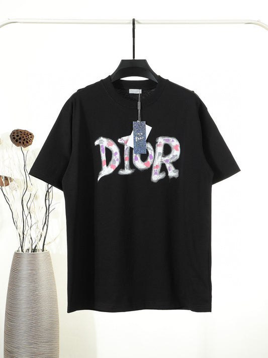 Black or White Distressed Letter Graphic T-Shirt with Color Accents