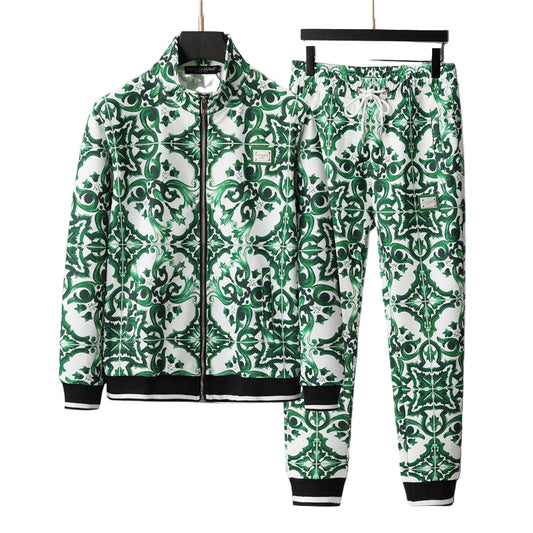 Green and white patterned jacket and pants set on a gray background
