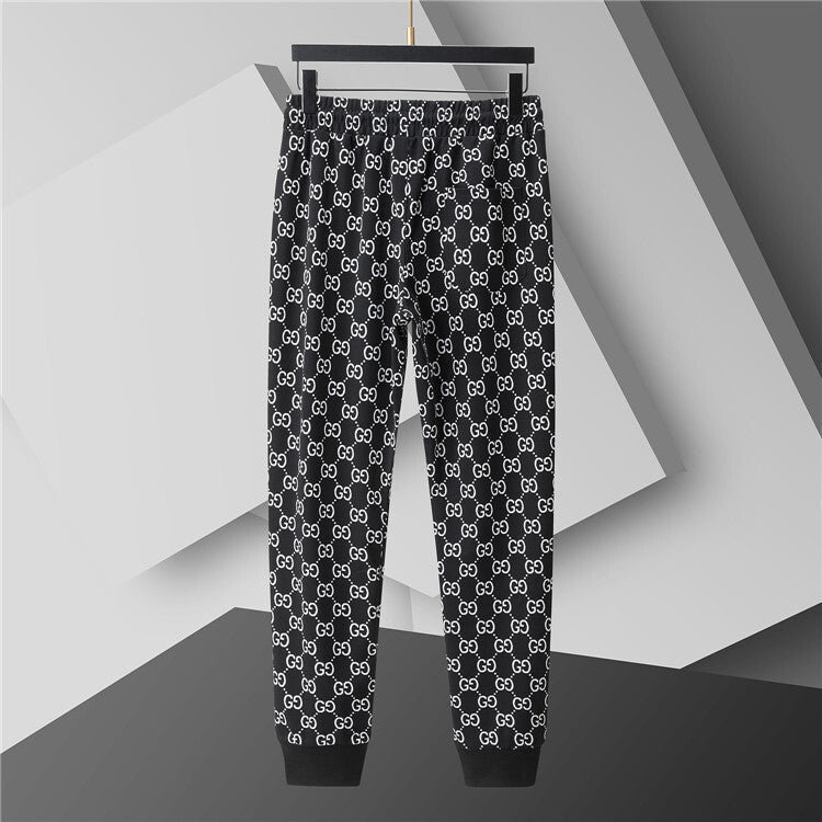 Black pants with white pattern on a gray background