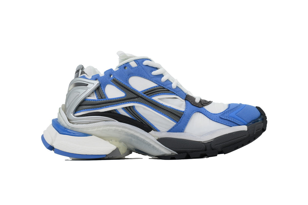 Blue and white athletic shoe with black accents on a white background