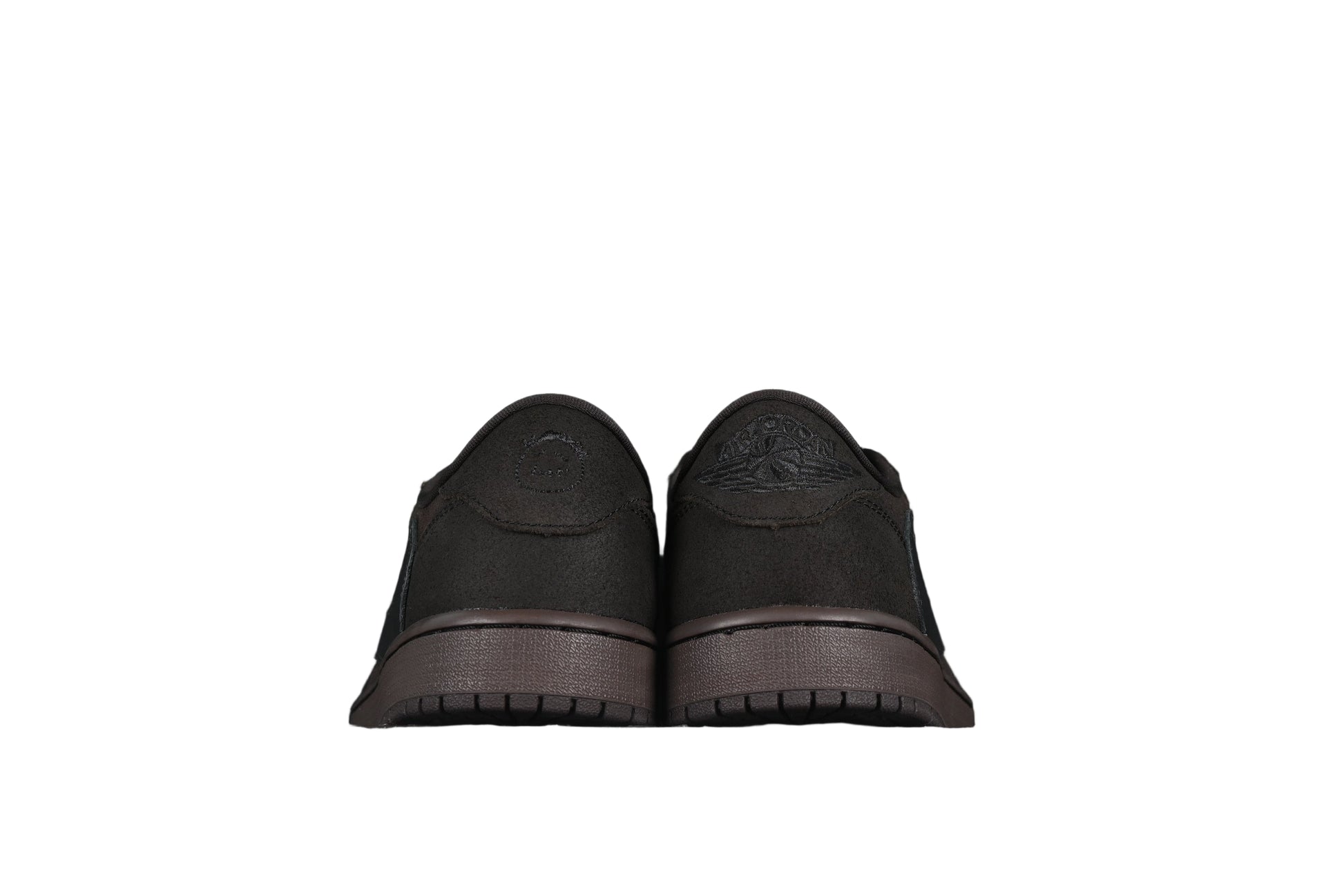 Pair of black shoes on a white background