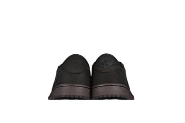 Pair of black shoes on a white background