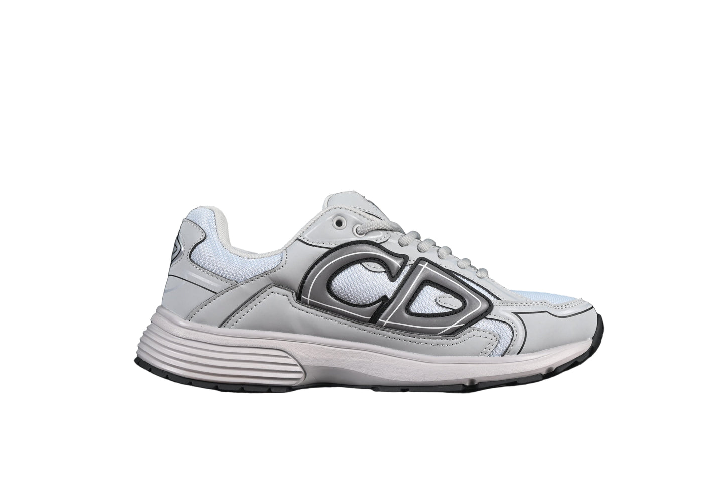 Gray running shoe with a graphicon a black background