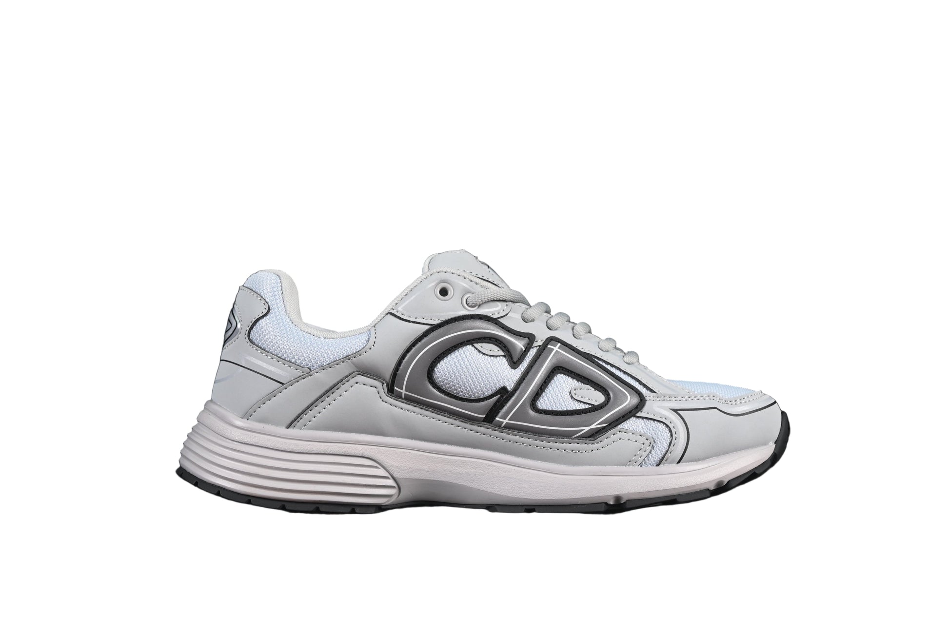 Gray running shoe with a graphicon a black background