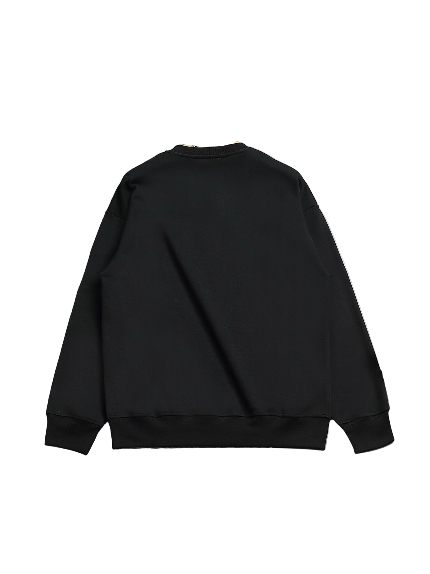Black sweatshirt on a hanger against a gray background