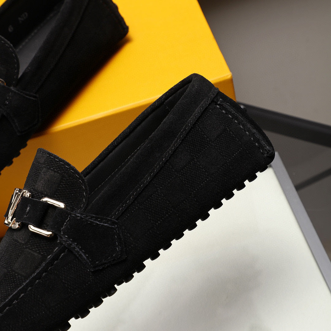 Black Textured Slip-On Loafers – Polished Metal Accent