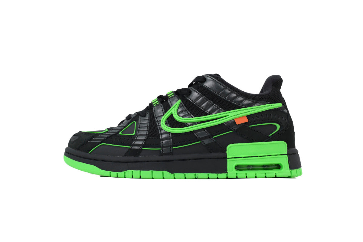 Black and green sneaker with a graphic on a white background