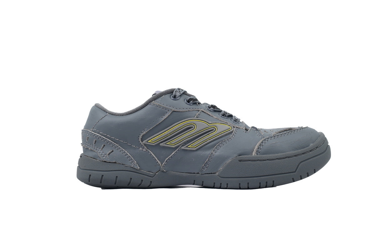 Gray athletic shoe with a green graphic on a white background