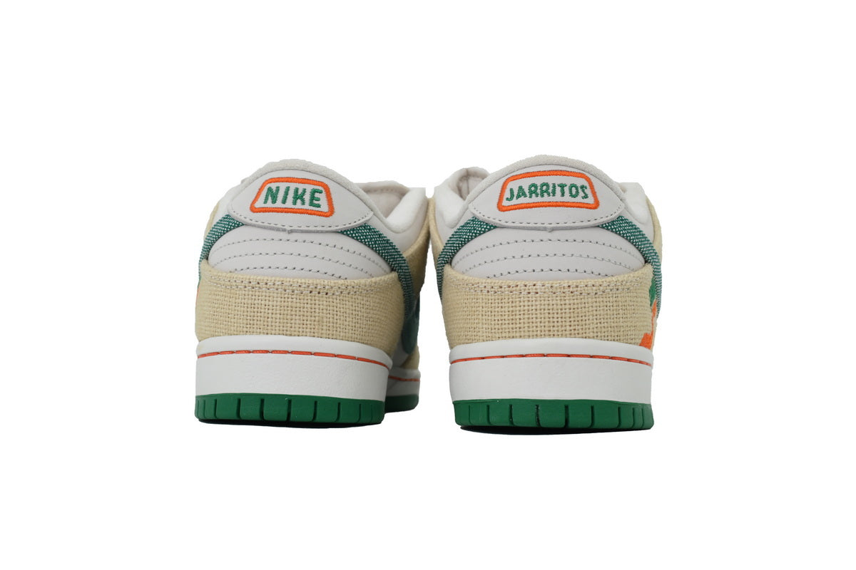 Cream and green canvas low-top sneaker with white leather panels, lace-up closure, and rubber outsole displayed from front and side angles.