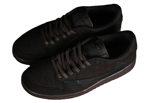 Pair of black sneakers on a white background