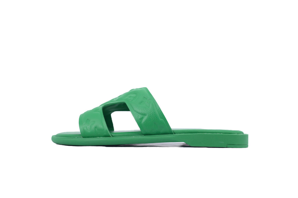Green sandal on a white background