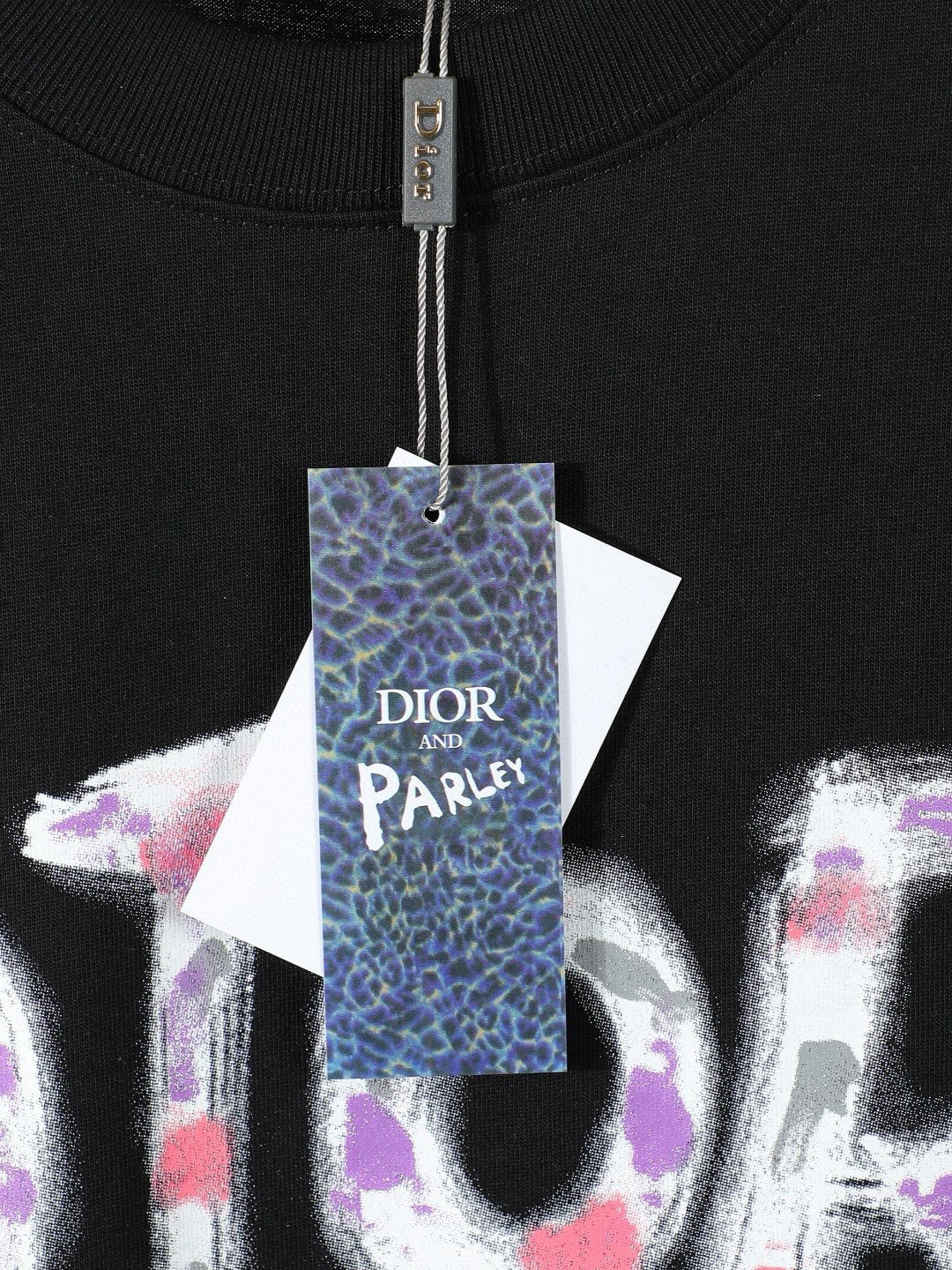Black or White Distressed Letter Graphic T-Shirt with Color Accents