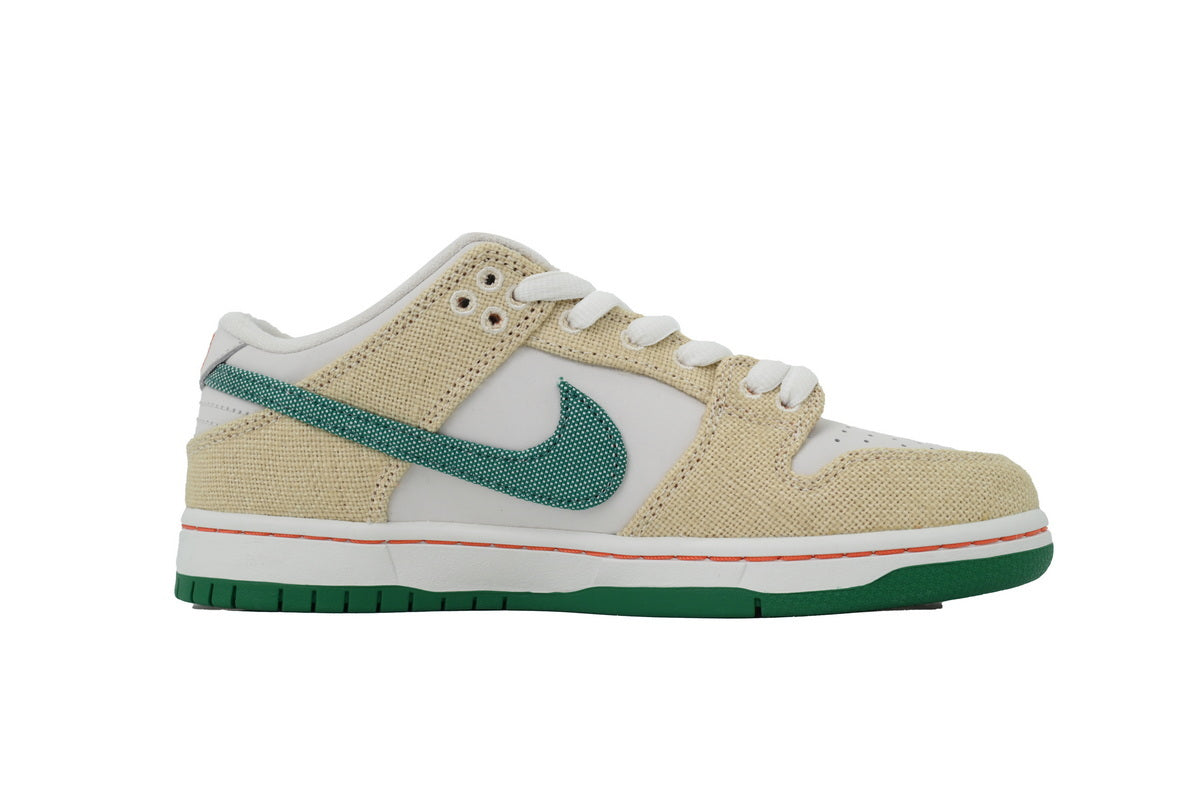 Cream and green canvas low-top sneaker with white leather panels, lace-up closure, and rubber outsole displayed from front and side angles.