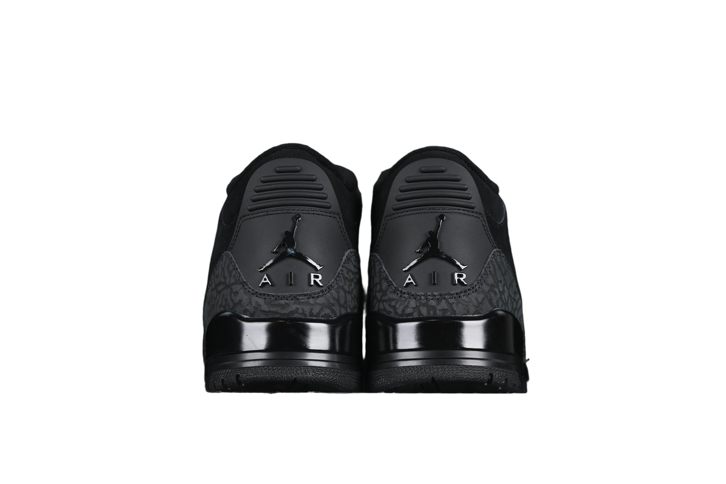 Black sneakers on a white background