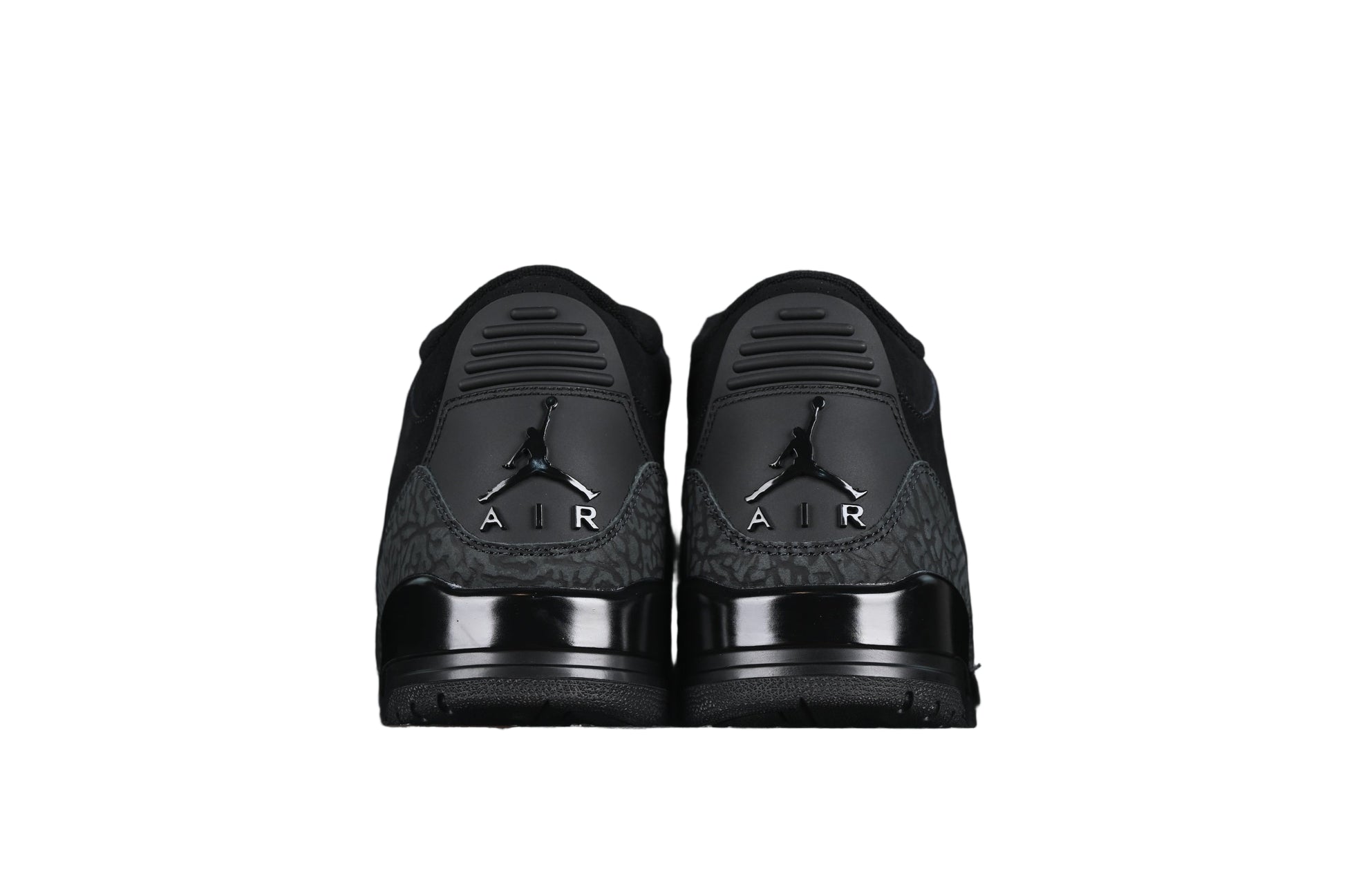 Black sneakers on a white background