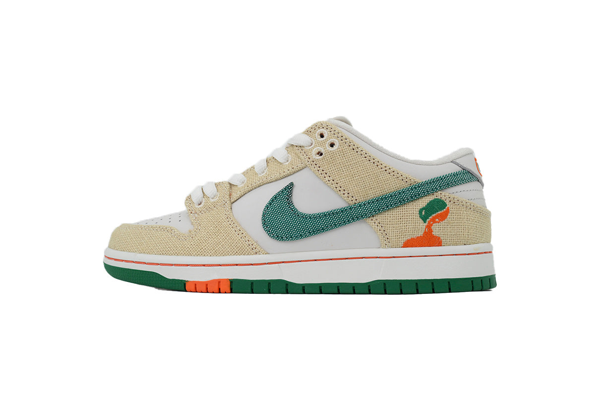 Cream and green canvas low-top sneaker with white leather panels, lace-up closure, and rubber outsole displayed from front and side angles.