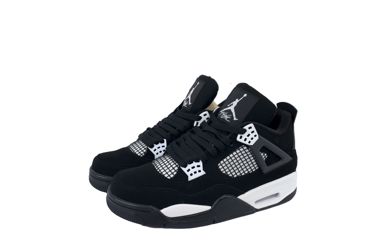 Black sneakers with white accents on a white background