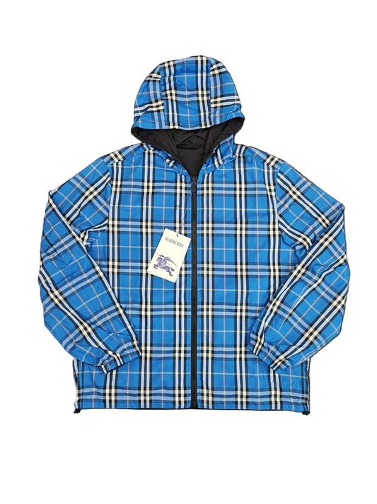 Blue plaid jacket with a hood on a black background