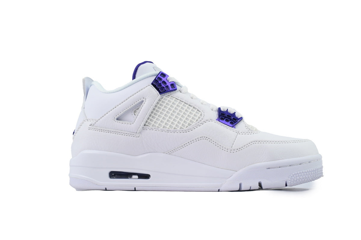 White sneaker with purple accents on a white background