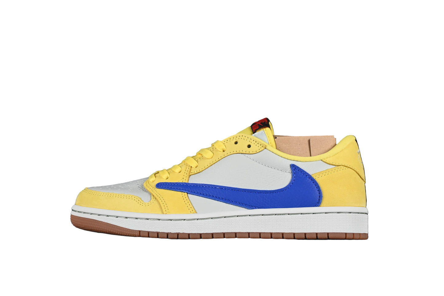Yellow and blue sneaker with a white sole on a white background