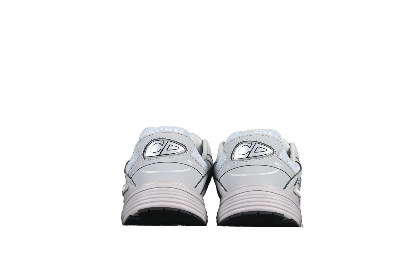 Pair of gray sneakers on a black background