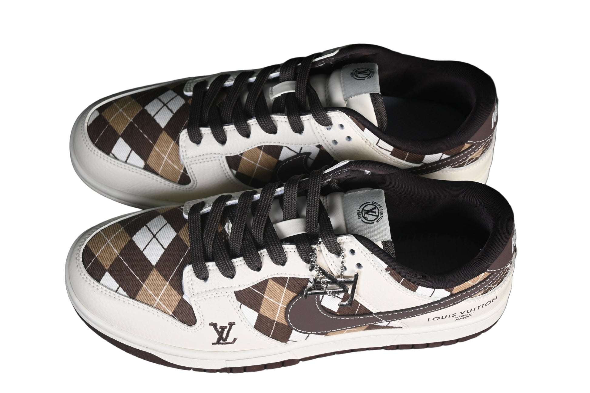 Pair of  sneakers with patterned design on a black background