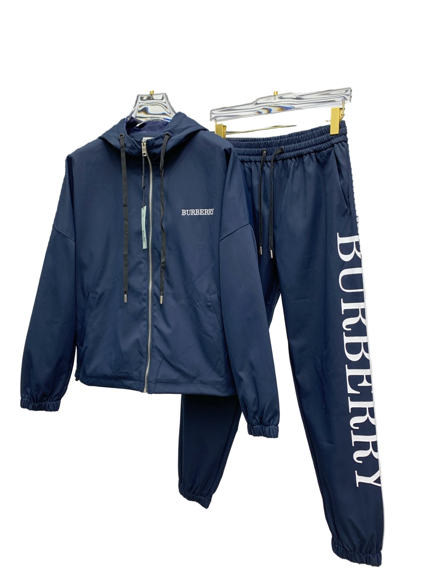 Navy blue  tracksuit on a white background