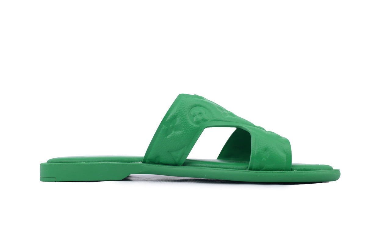 Green sandal on a white background
