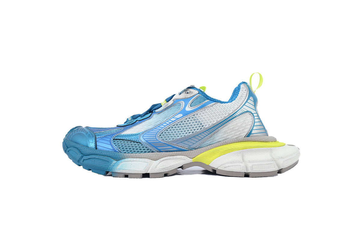 Blue and white running shoe with yellow accents on a white background